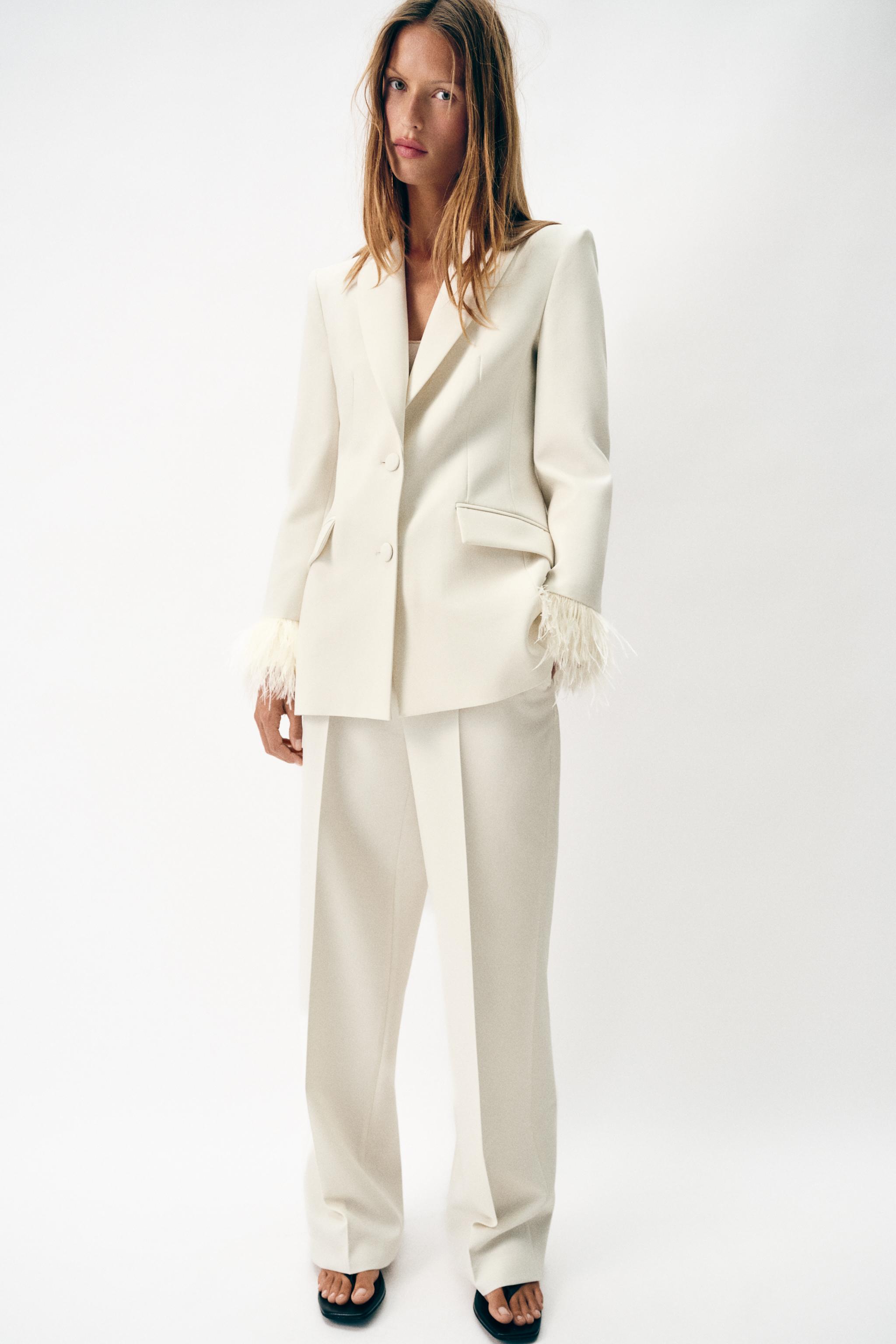 BLAZER WITH FEATHER CUFFS